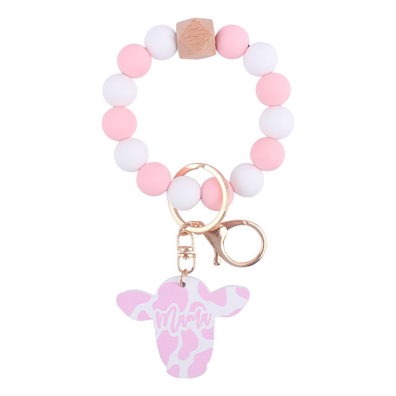 Wholesale Silicone Beads Cartoon Western Style Bull Head Wooden Sign Pendant Bracelet Keychains